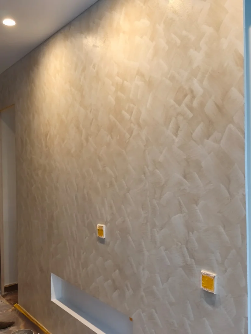 Finished limewash feature wall by City Painters in a Singapore home